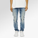 Purple Brand P001 Thrashed Jeans In Mid Indigo